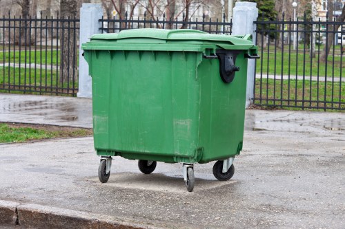Collection crew sorting commercial recyclables on a street in Crouch End